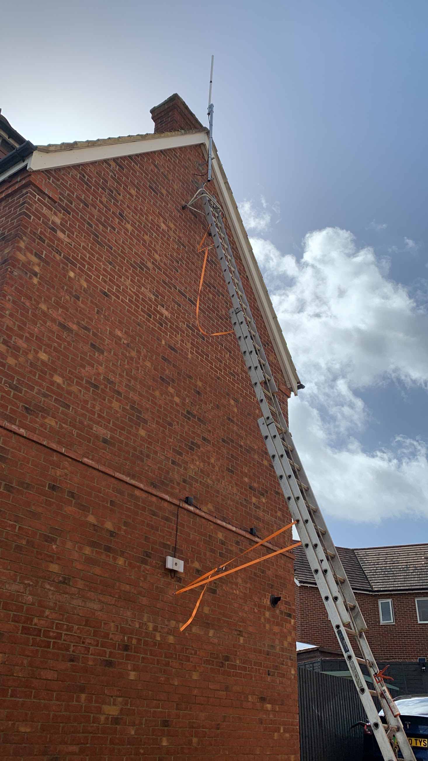 TV aerial installation in Milton Keynes - MK-Aerials technician on ladder